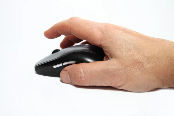 Рука людини з комп'ютерною мишкою — стокове фото