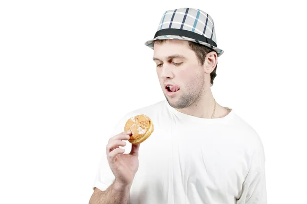 Homem com um donut na mão — Fotografia de Stock