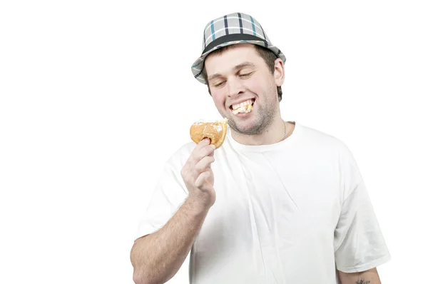 अपने हाथ में एक डोनट के साथ आदमी — स्टॉक फ़ोटो, इमेज