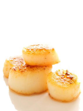 Pan seared sea scallops clipart