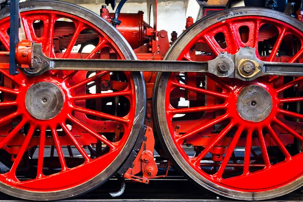 stock image Two large red wheels of the old steam locomotive