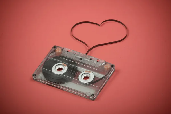 stock image Audio cassette with tape shaping a heart