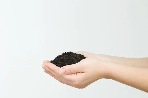 stock image Hand holding soil