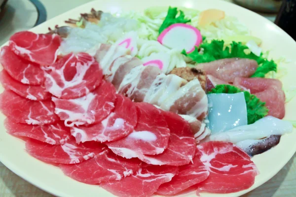 Sliced pork on dish — Stock Photo, Image