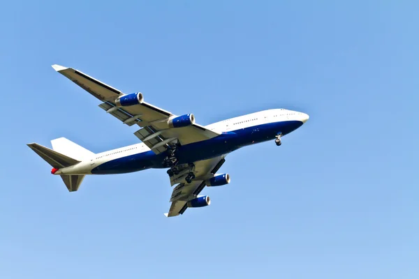 stock image White air plane flying in the sky