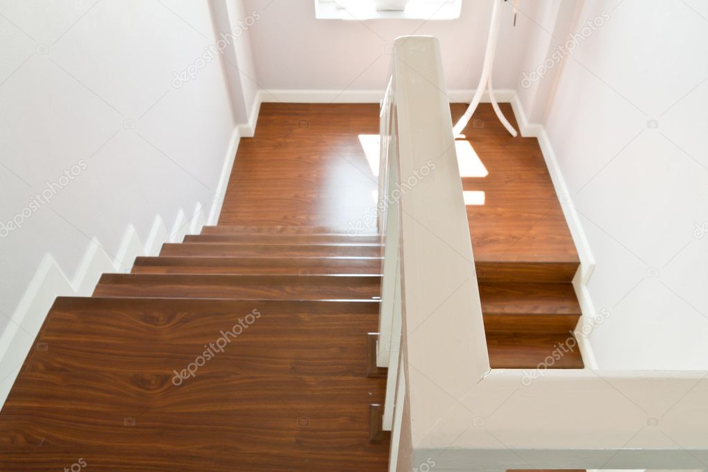 Wooden stairs with hand rail
