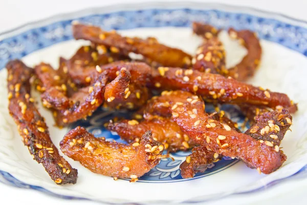 Fried pork on dish — Stock Photo, Image