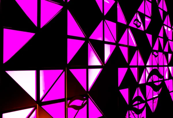 Luz rosa abstrato atrás de preto — Fotografia de Stock