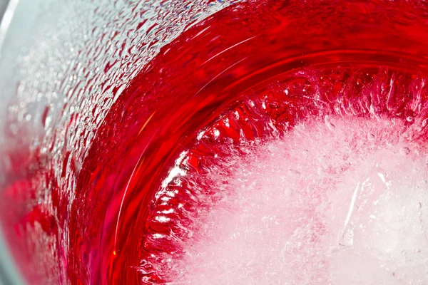 Red cream soda syrup in frozen glass from top close up — Stock Photo, Image