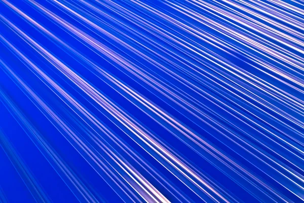 Abstraktní bílé světlo linie na modré — Stock fotografie