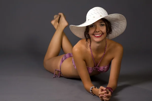 Beautiful young woman in a bikini — Stock Photo, Image