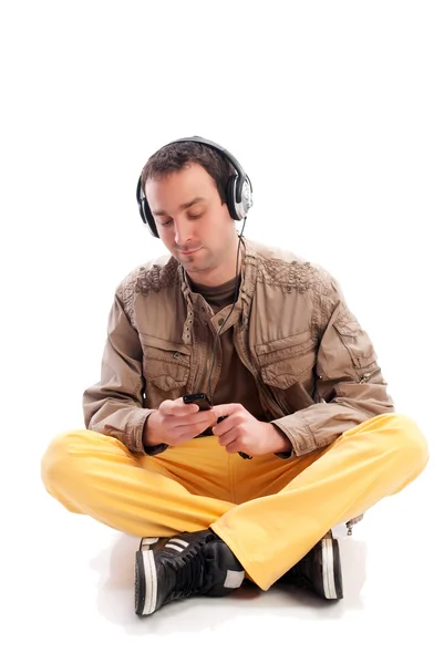 stock image Young man with headphones