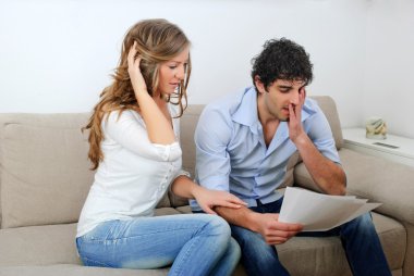 Young Couple Dealing with Their Finances clipart