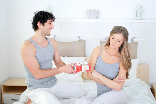 Guy giving a gift — Stock Photo, Image