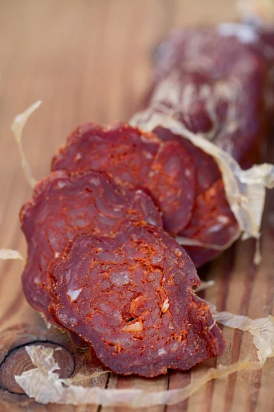 Espanhol fino jamon chouriço salsicha, rasa dof — Fotografia de Stock
