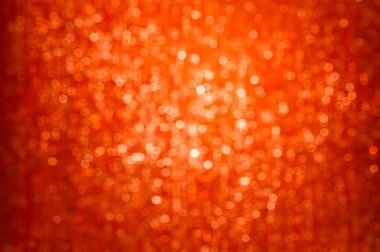 Golden red glitter sparkles background clipart