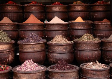 Dried herbs flowers spices in the Marrakesh street shop clipart