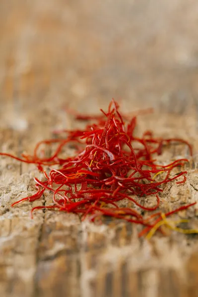 stock image Moroccan saffron treads in pile, on wood