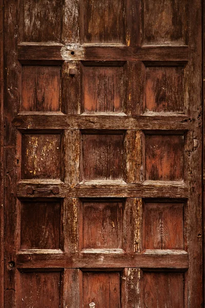 Old ornamental wooden carved door — Stock Photo, Image