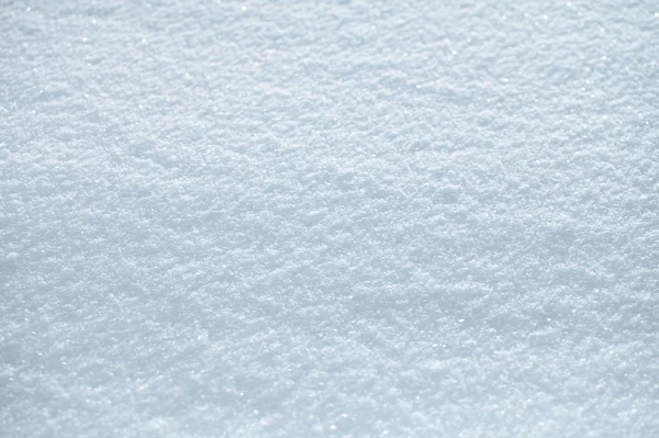 Χιόνι μπλε φόντο, πολύ μικρό εστίαση — Φωτογραφία Αρχείου