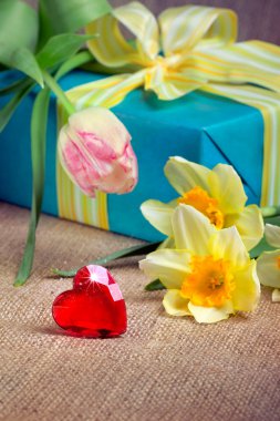 Valentine's day concept: red heart with gift box and flowers clipart