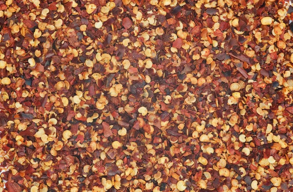 Crushed Chillies for use as background — Stock Photo, Image