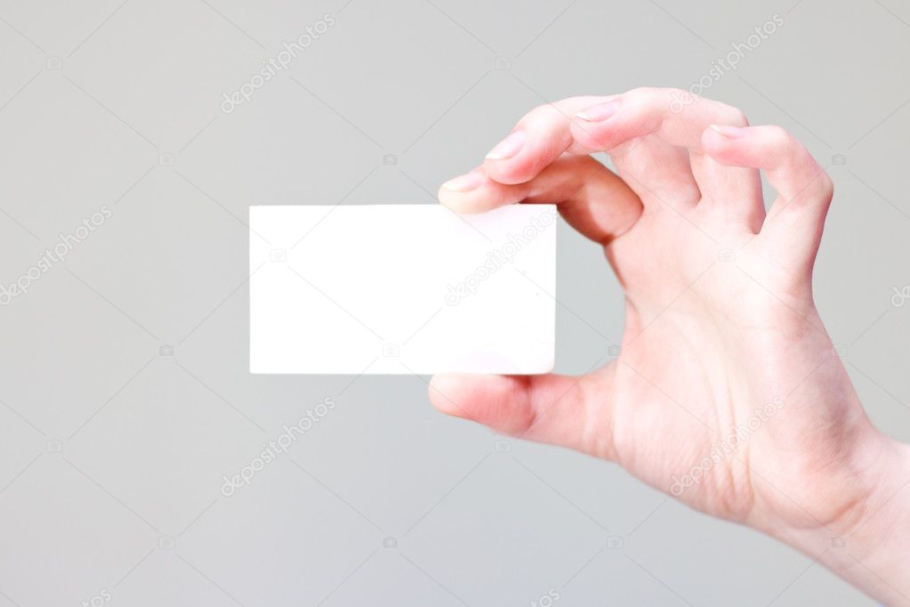 Bussines card in hand for your information and logo in a grey background