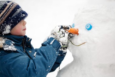 The child and the Snowman clipart