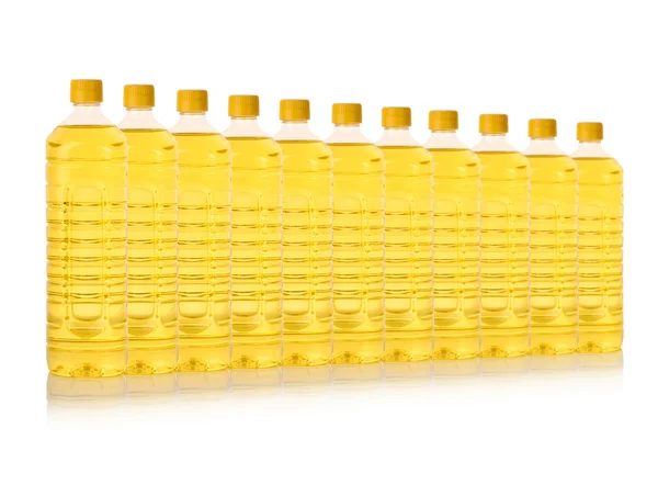 Frasco de aceite de cocina en una fila aislado en blanco — Foto de Stock