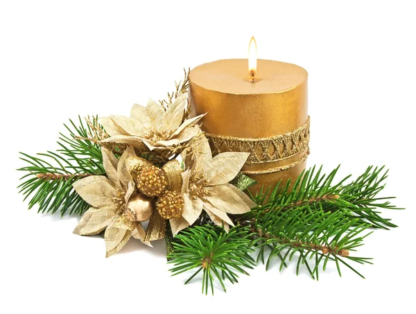 Рождественские украшения при свечах и пуансеттии Стоковое Изображение