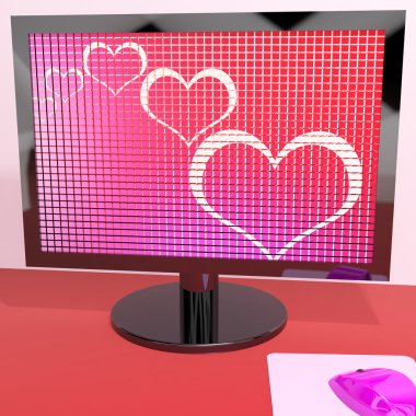 Hearts On Computer Screen Showing Love And Online Dating clipart