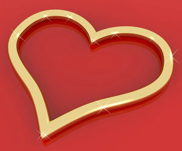 Золотое кольцо в форме сердца, представляющее любовь и романтику — стоковое фото