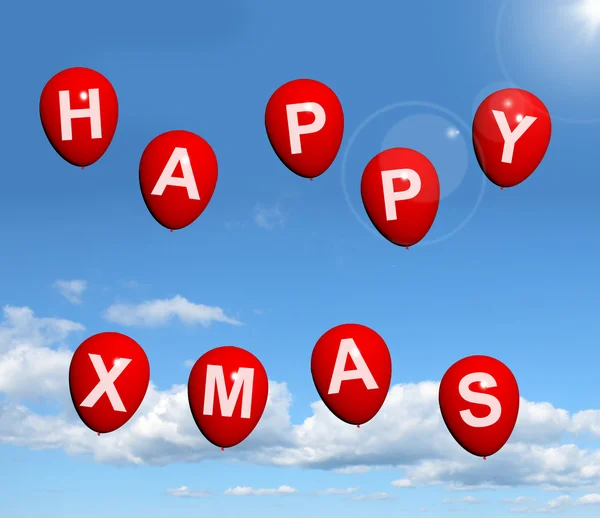 Balões vermelhos no céu Ortografia Feliz Natal — Fotografia de Stock