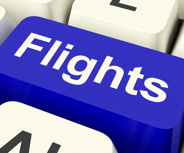 Flights Key In Blue For Overseas Vacation Or Holiday — Stock Photo, Image