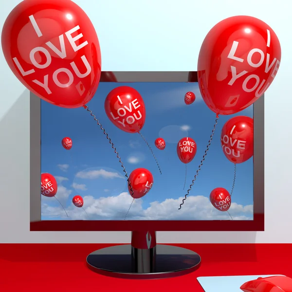 Je t'aime ballons de l'écran d'ordinateur montrant l'amour et en ligne — Photo