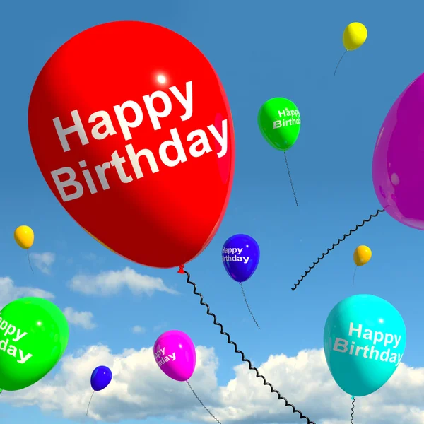 Balões multicoloridos no céu para celebrar um feliz nascimento — Fotografia de Stock