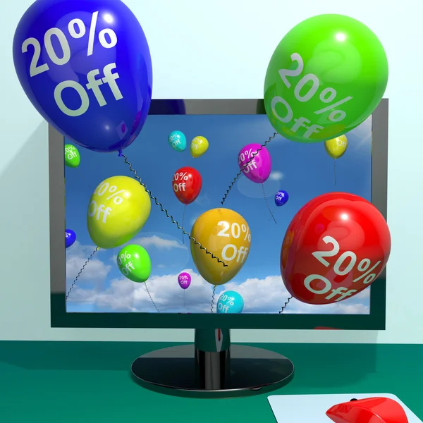 Воздушные шары от компьютера, демонстрирующего скидку в 20% — стоковое фото
