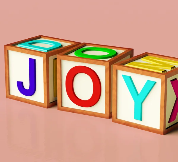 Kids block stavning glädje som symbol för kul och spela — Stockfoto
