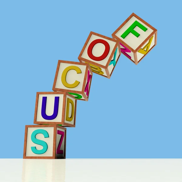 Blokken spelling focus omvallen als symbool bij gebrek aan concent — Stockfoto