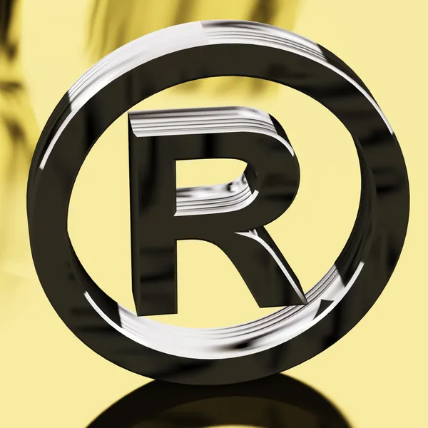Ασημένιο σύμβολο κατατεθέντος που αντιπροσωπεύουν την κατοχυρωμένη με δίπλωμα ευρεσιτεχνίας μάρκες — Φωτογραφία Αρχείου
