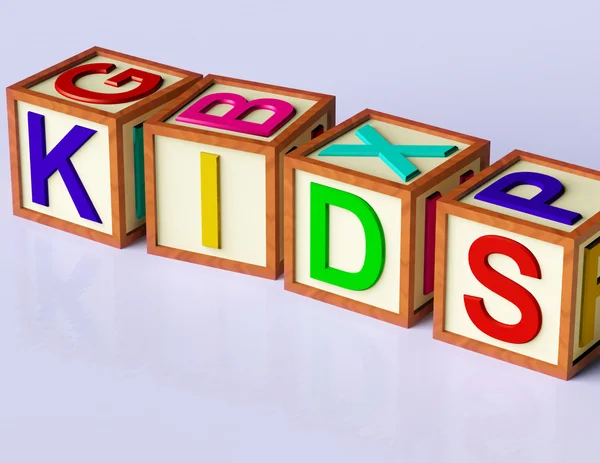 Blocks Spelling Kids As Symbol for Childhood and Children — стоковое фото