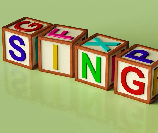 Crianças bloqueia ortografia Cantar como símbolo para cantar e música — Fotografia de Stock