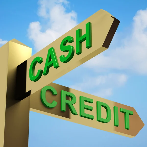 Direcciones de efectivo o crédito en una señal —  Fotos de Stock