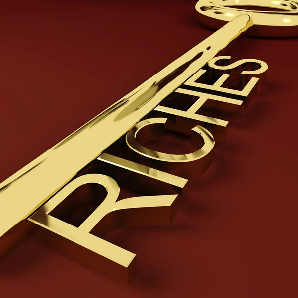 Riquezas chave representando riqueza e tesouro — Fotografia de Stock