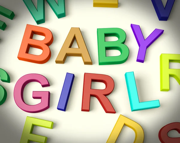 Baby flicka skrivet med barn bokstäver — Stockfoto