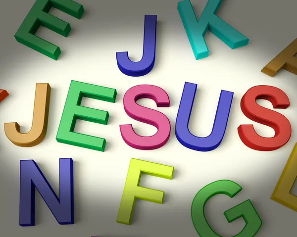 Иисус, написанный пластмассовыми детьми — стоковое фото