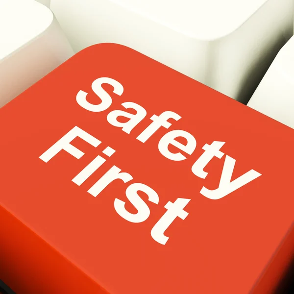 Safety First Computer Key Showing Caution Protection And Hazards — Stock Photo, Image
