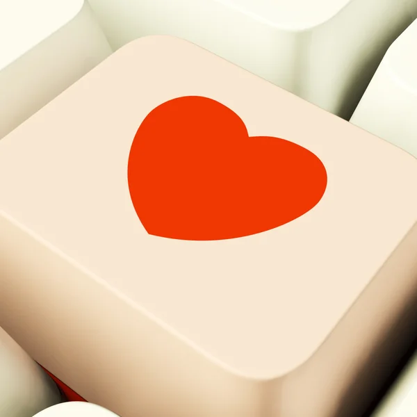 Hjärtat ikonen på Rosa dator nyckel visar kärlek och romantik för val — Stockfoto