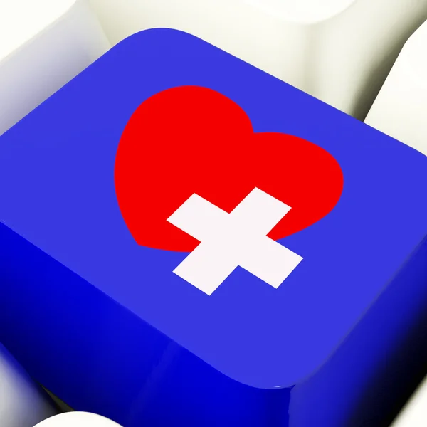 Chave do computador do coração e da cruz no azul que mostra a assistência de emergência — Fotografia de Stock