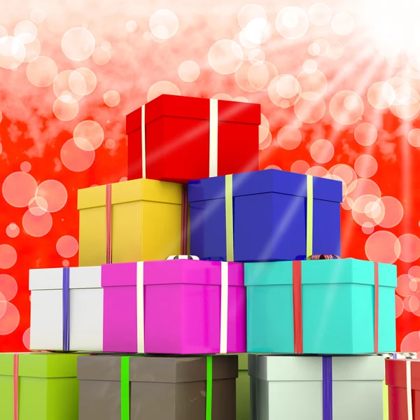 Th へのプレゼントとして背景のボケ味を持つ多色 giftboxes — ストック写真